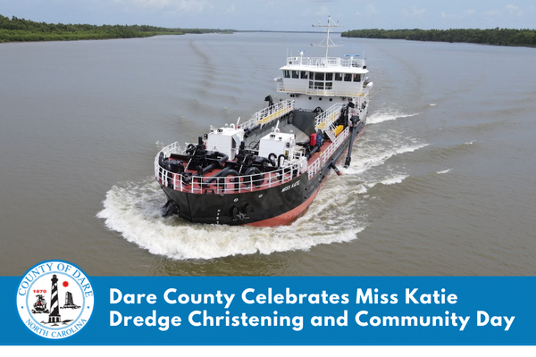 Image of the Miss Katie dredge on the water. Text overlay reads, "Dare County Celebrates Miss Katie Dredge Christening and Community Day"