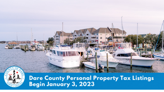 Image of the Manteo Marina. Text overlay reads, "Dare County Personal Property Tax Listings Begin January 3, 2023"