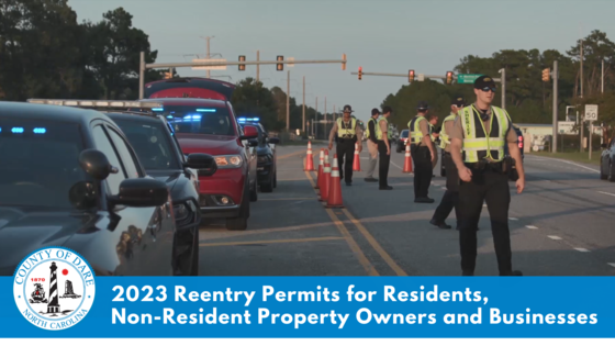 Image of a police check point in the Outer Banks. Text reads: 2023 Reentry Permits for Residents, Non-Resident Property Owners and Businesses