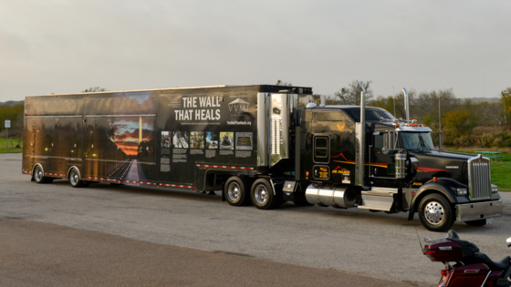 Image of "The Wall That Heals" truck on the road.