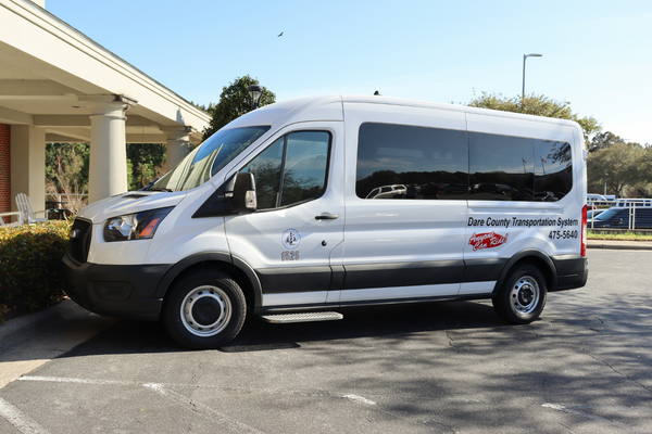 Image of one of the new white Dare County transportation vans.
