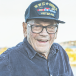 Image of a veteran wearing a hat which reads, "WWII Korea Veteran"