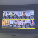 Image of The Wall That Heals' Hometown Heroes display featuring "In Memory" submissions.