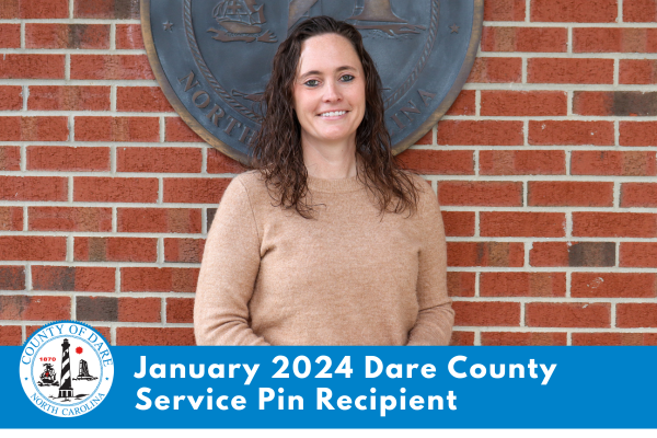 Image of Allison Woodard standing in front of a brick wall. Text overlay reads, "January 2024 Dare County Service Pin Recipient"