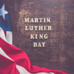 Image of American flag with text overlay that reads, "Martin Luther King Jr. Day"