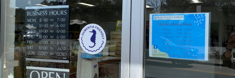Image of the “dementia-friendly” certified sticker on the Manteo Library's front entrance.