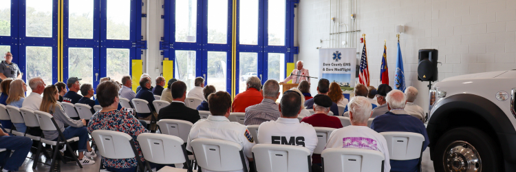 Image of Chairman Woodard speaking to the crowd gathered for the ribbon cutting ceremony.