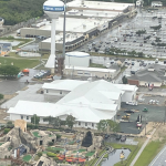 Aerial image of the EMS Station 1 facility construction progress, featuring the Kill Devil Hills water tower in the background.