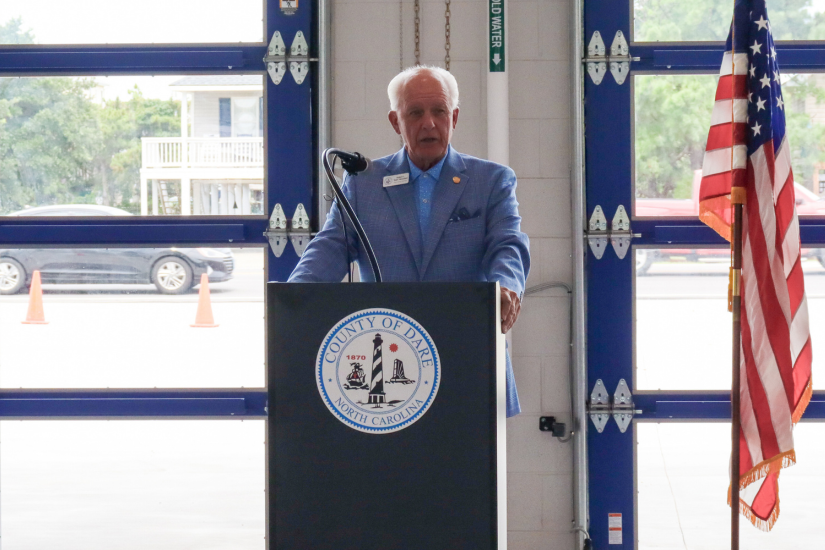 Image of Dare County Board of Commissioners Chairman Woodard speaking during the ceremony.