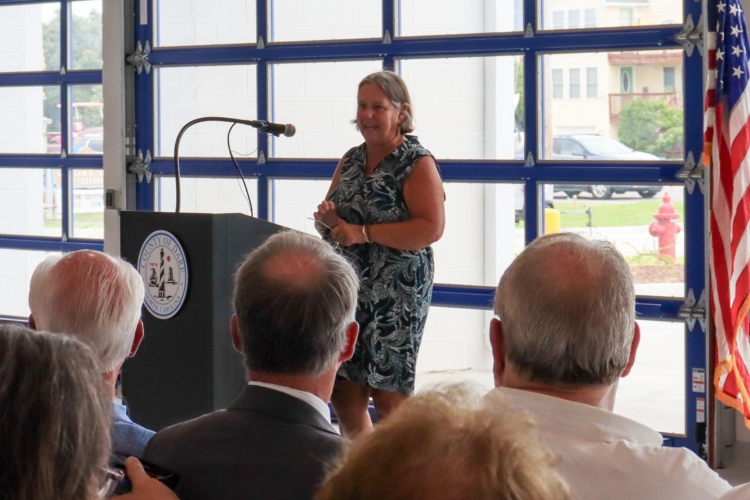 Photo of Susan Gard Nelson delivering a speech during the opening ceremony.