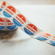 Image of a spool of "I Voted Today" stickers sitting on a table.