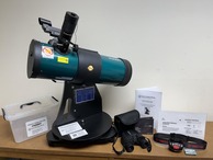 Library Telescope with supplemental materials and books
