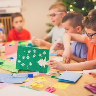 Image of children making Christmas cards.