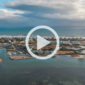 Aerial image of Hatteras Village featuring the ocean and sound.