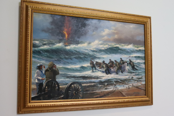 Painting depicts the launch of a surfboat from the Chicamacomico Coast Guard Station on Hatteras Island into towering waves on August 16, 1918.