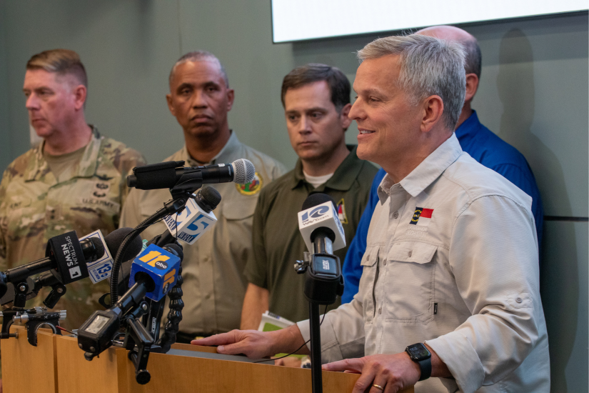 Image of Governor Stein speaking at the conference.