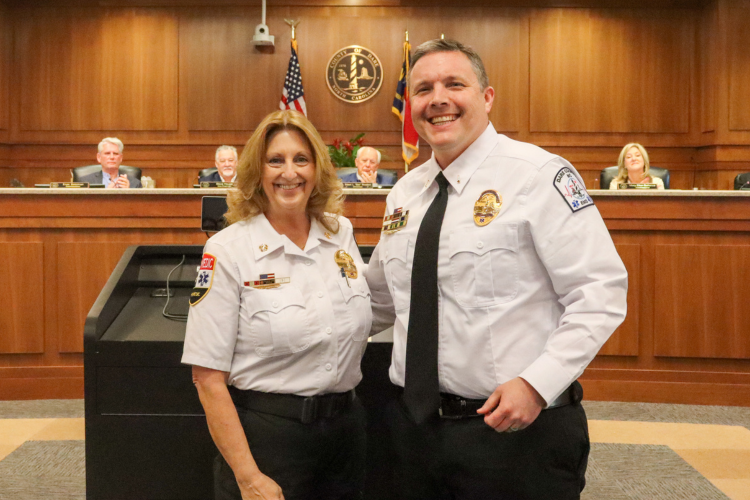 Joshua Mckenny, Lieutenant for Dare County EMS receives 10-year pin from Dare County EMS Director Chief Jennie Collins.