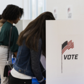 Image of women voting within white screened boxes that read "VOTE"