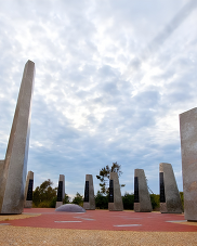 Icarus Monument to a Century of Flight featuring tall granite pillars.