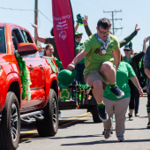 Image of people walking in a St. Patrick's Day Parade
