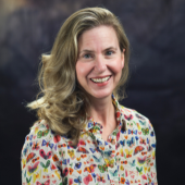 Image of Librarian Bowman wearing a butterfly-printed shirt