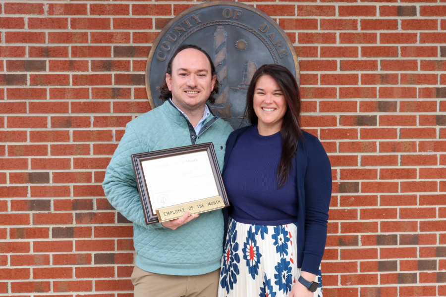 Barton Grover stands with girlfriend, Elizabeth Dixon, who attended the presentation.