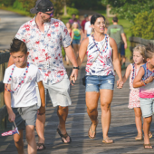 Image of a family decked out in patriotic clothing.