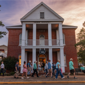 Image of the Dare Arts building with people walking in front.