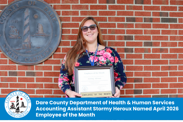 Image of Employee of the Month Stormy Heroux holding her certificate