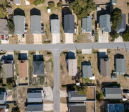 Aerial image of the roofs of houses in a neighborhood.