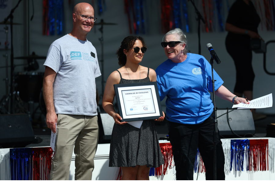 Zofia Brewer accepting her award.