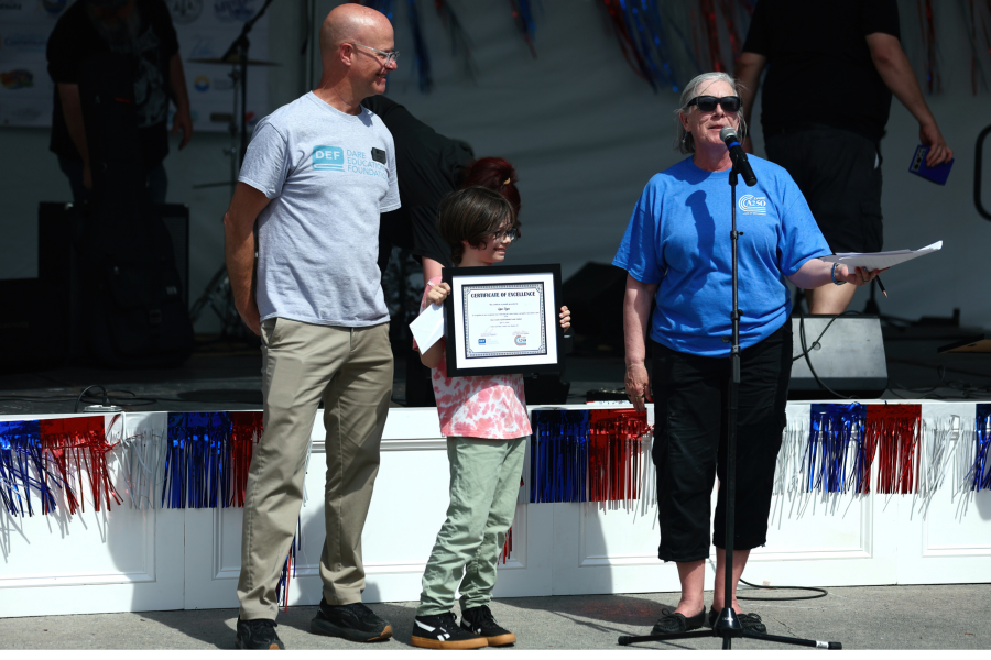 Logan Veyna accepting his award.