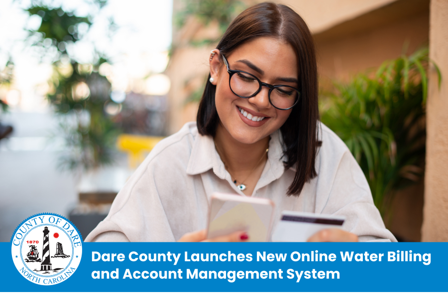 A woman pays a bill online with a credit card. Heading: Dare County Launches New Online Water Billing and Account Management System