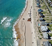 Aerial image of nourishment equipment along the shore in Avon, NC.