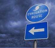 Image of a sign that reads "Hurricane evacuation route" with an arrow.