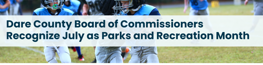 Image of young boys playing football. Subheading reads: Dare County Board of Commissioners Recognize July as Parks and Recreation Month