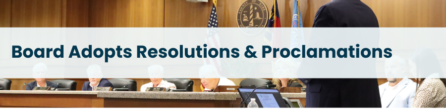 Image of the Board of Commissioners. Subheading: Board Adopts Resolutions & Proclamations