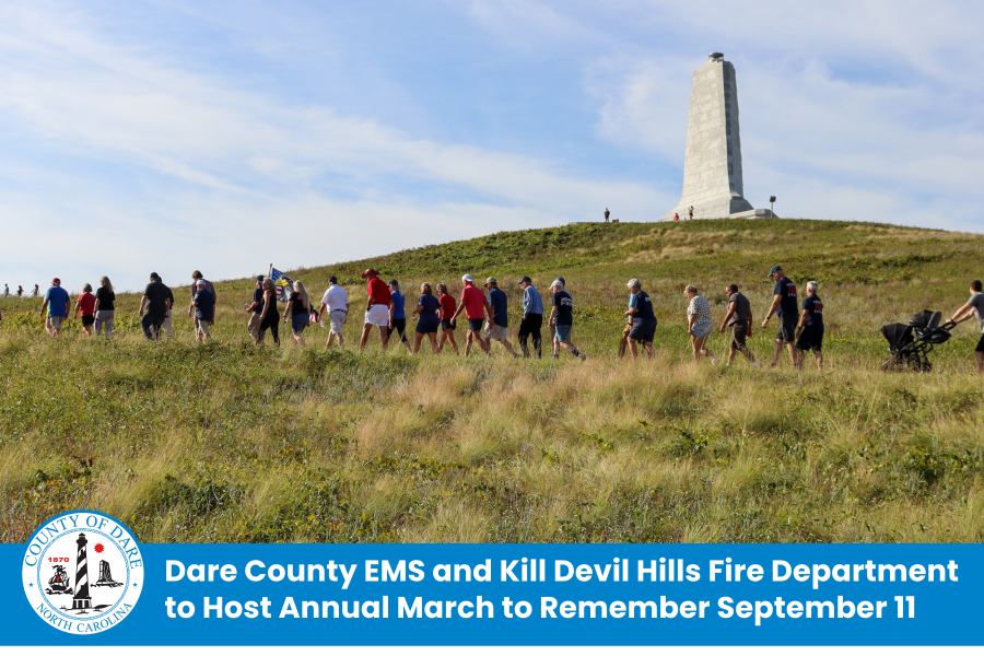 People at Wright Brothers Monument. Heading: Dare County EMS and Kill Devil Hills Fire Department to Host Annual March to Remember September 11