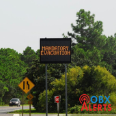 Electronic sign reads, "Mandatory Evacuation". The logo for OBX Alerts sits over the image as a watermark.