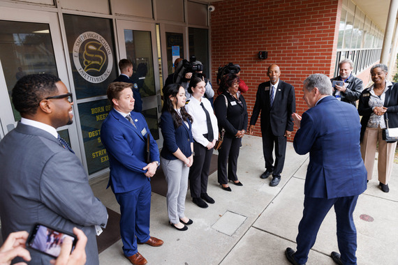 Governor Cooper engaging with an E.E. Smith High student