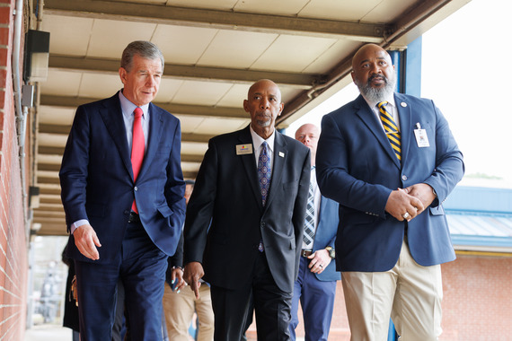 Governor Cooper touring E.E. Smith High with Dr. Connelly and Larry Parker, principal