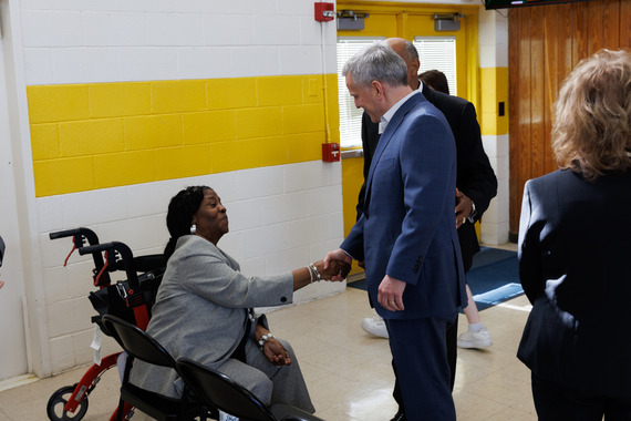 The Governor shakes Mrs. Musgrave's hand