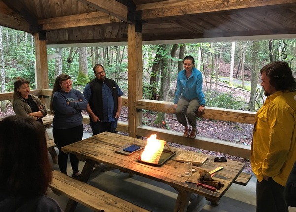 Holmes Educational State Forest staff demonstrating the Matchstick Forest activity to students in the fire-focused Project Learning Tree Workshop.