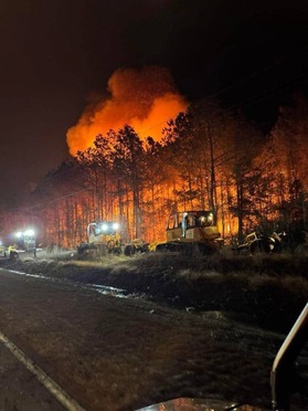 Multiple NCFS tractor plow units build lines in response to the Crusoe Island Road Fire that burned in Columbus County in March 2025. 