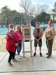 Jacob Allen and members of the Two Green Thumbs Gardening club with the finished seed library