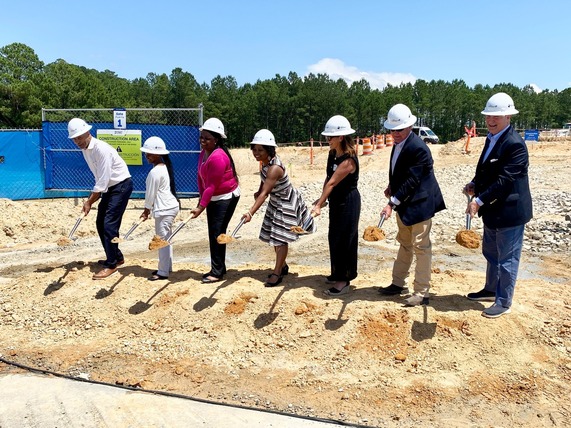 Mayor Day breaks ground on The Garden facility with members of the Raleigh Rescue Mission