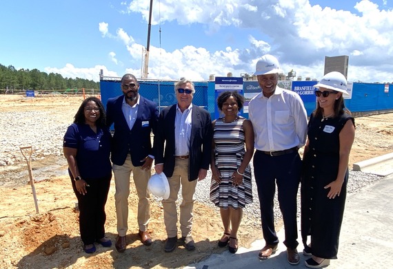 Mayor Day stands with members of The Raleigh Rescue Mission and Knightdale Town Council
