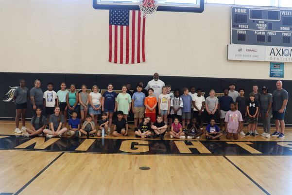Group photo of Camp PRIDE participants and staff members