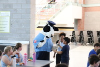 Camp PRIDE Students chat with the Chick-Fil-A Cow