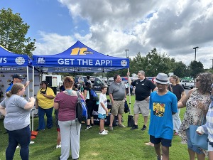 Community members get information from ABC11 tent at Knightdale Arts and Education Festival, August 16, 2025)